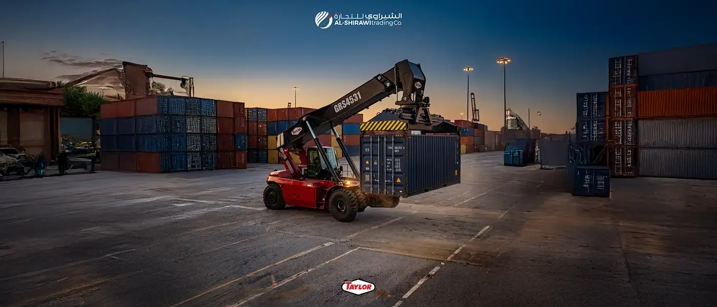 Taylor container handler stacking shipping containers in a UAE container yard